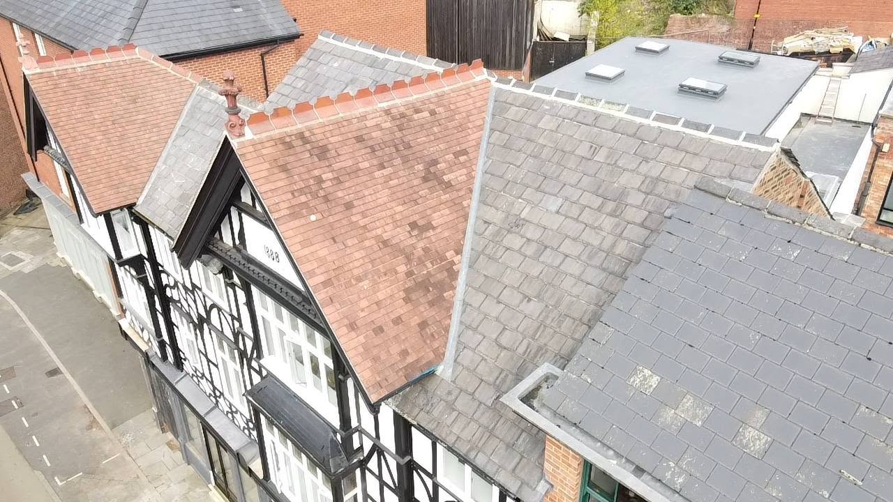 Heritage slate and clay tile re-roof on a period building