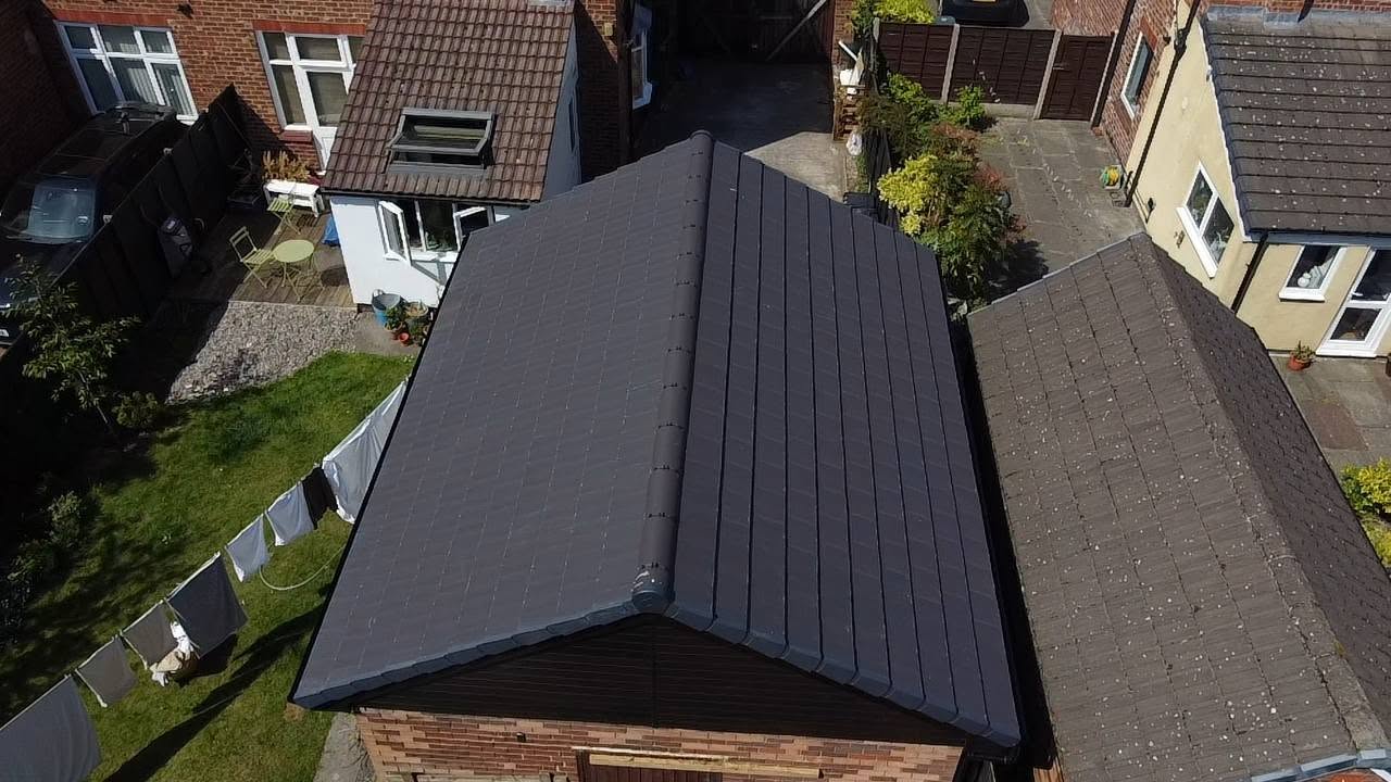 New anthracite grey tiled roof